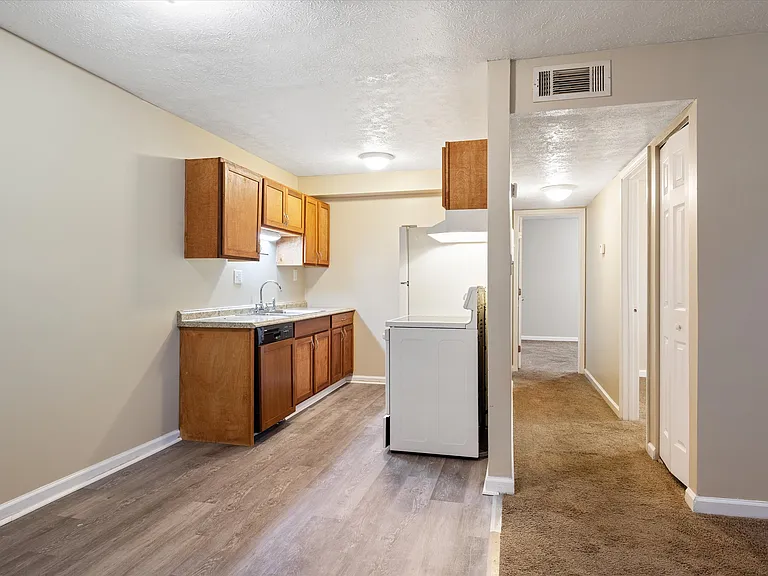 Eat-In Kitchen with Luxury Plank Flooring, Dishwasher, Fridge and Stove!