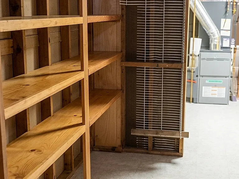 Basement includes large additional storage space (e.g., bikes, sports/camping equipment, suitcases, dry goods) and/or bonus area (e.g., home gym, craft/creative workspace area).