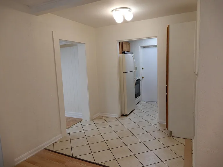 VIEW OF GALLEY KITCHEN FROM LIVING ROOM