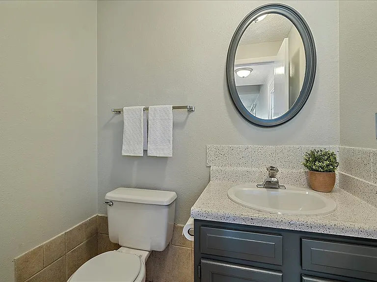 Mainfloor powder room has been freshly painted and updated.