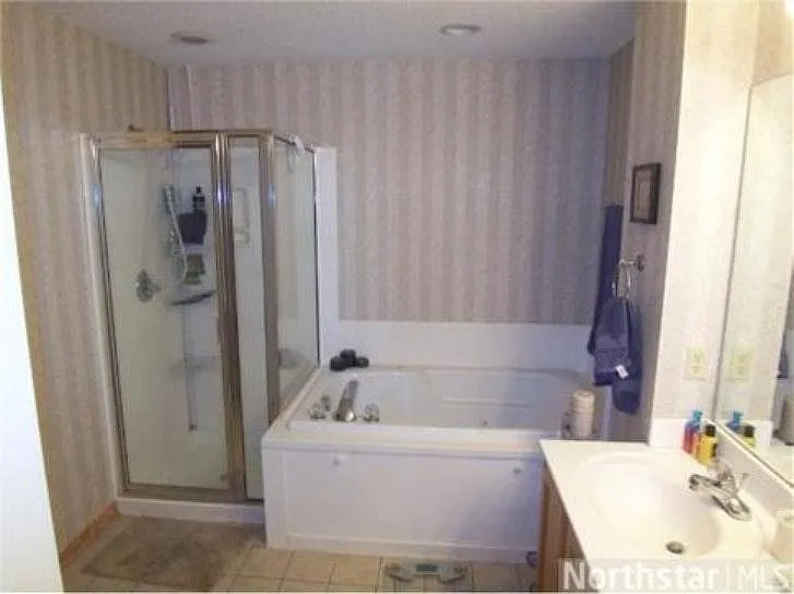 Tile is a beige color, not shown in picture.
