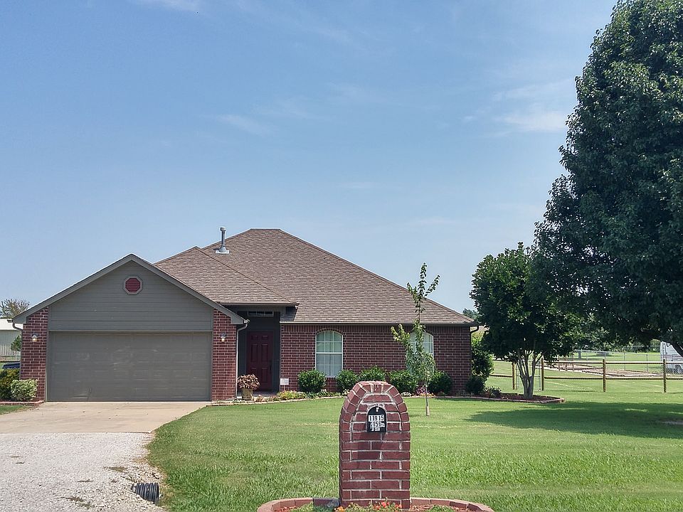 Full Brick home on 1 ac m/l with Shop building