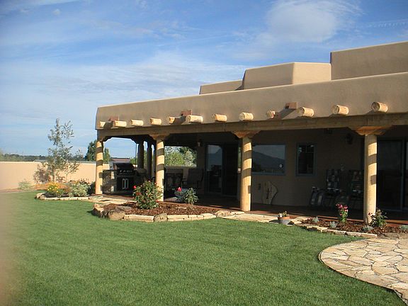 covered deck and backyard