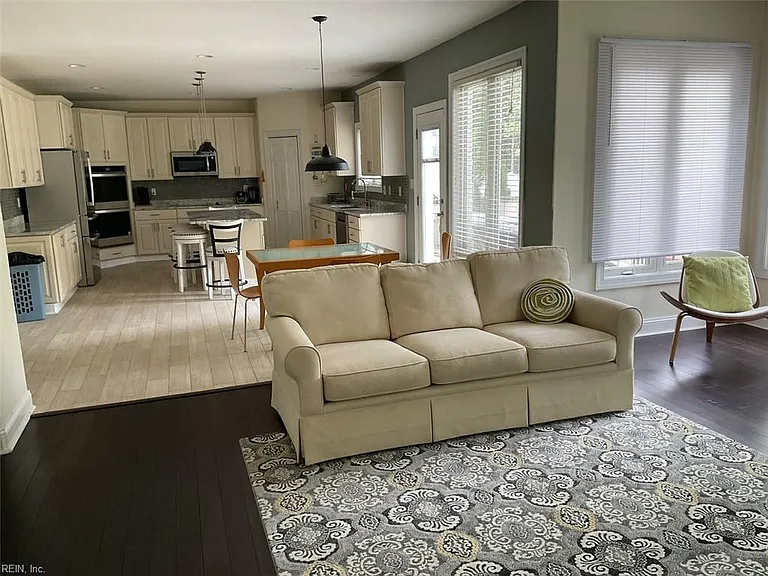 View from Family room to eat-in area and open Kitchen