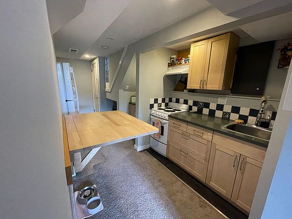 Kitchen has no dishwasher. Circulating vent above stove is good for light cooking.