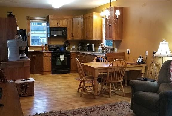 Open Living area into large Custom Kitchen