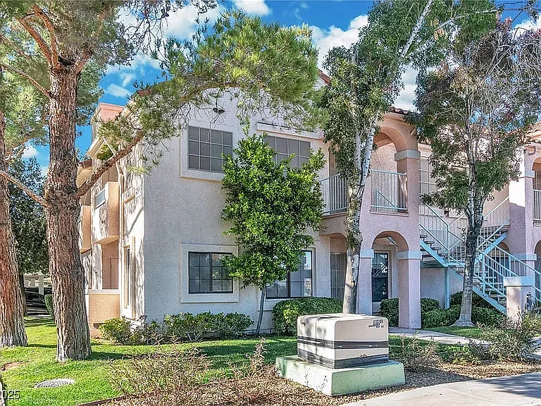 4893 S Torrey Pines Dr #202 — Photo 1