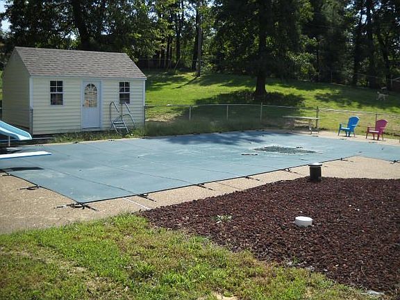 Ingound pool and shed