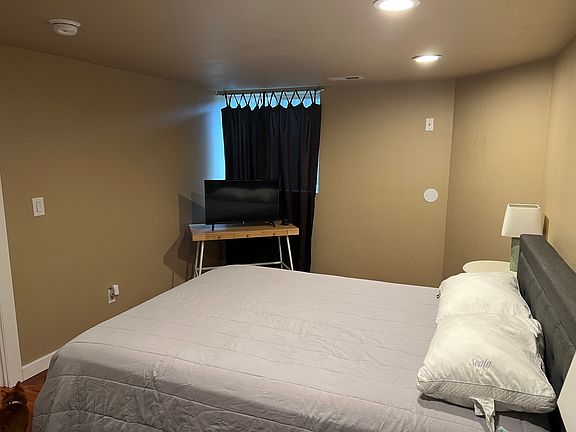 Primary Bedroom (Bed, desk, side tables, and lamps shown included with furnished option)