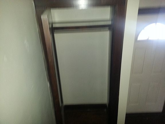 closet at bottom of steps