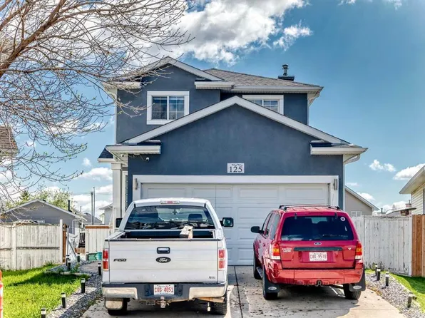 125 SW Coral Springs Bay NE, Calgary, AB T3J 3P4