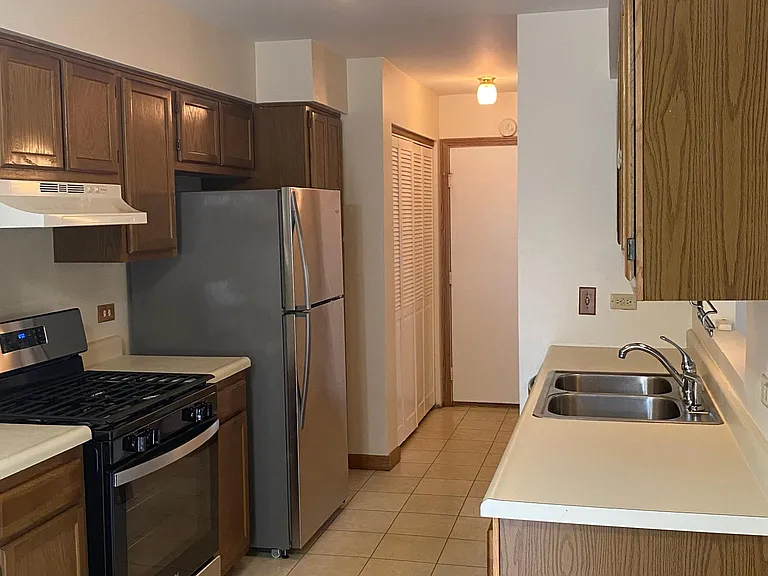 Kitchen- New appliances flows to laundry area and garage.