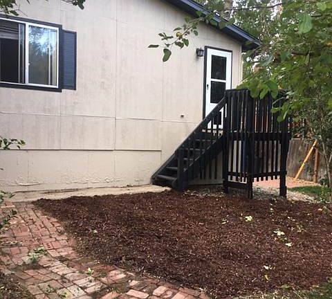 Backyard. Exterior side patio door.