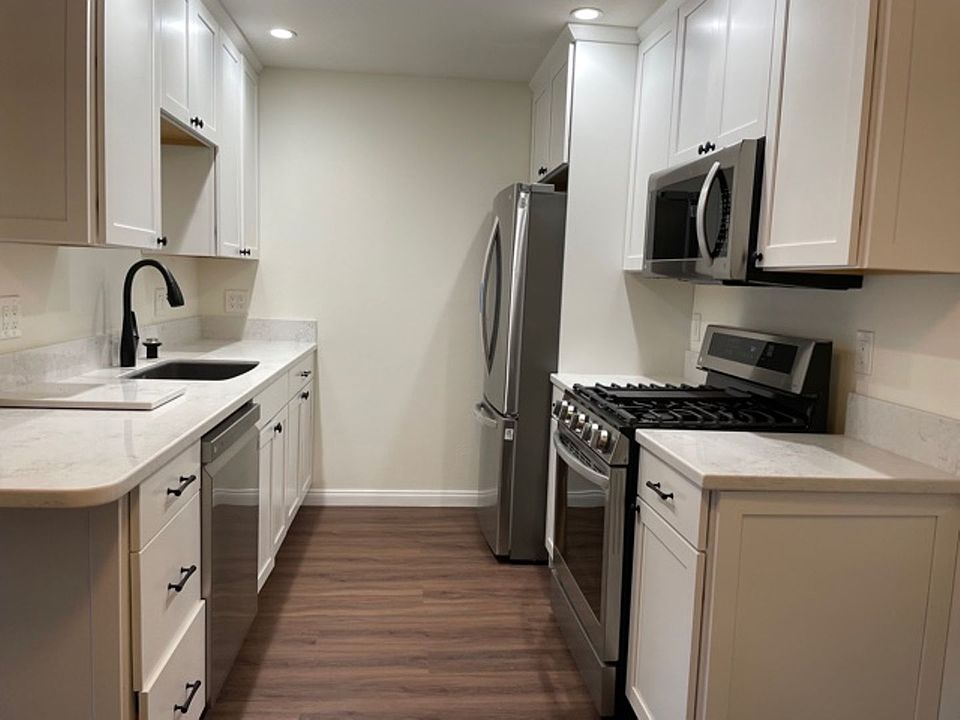 1st image of 6600 Warner Ave Unit 216