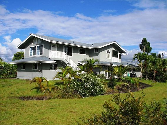 House from Hill in Yard