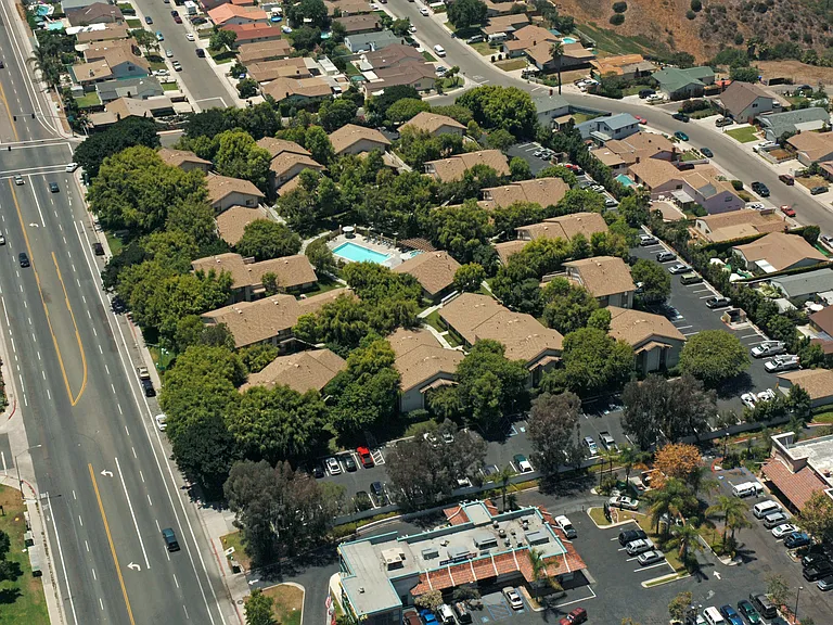 Aerial view of Foxwood Apartments' exclusive forested greenbelt area!