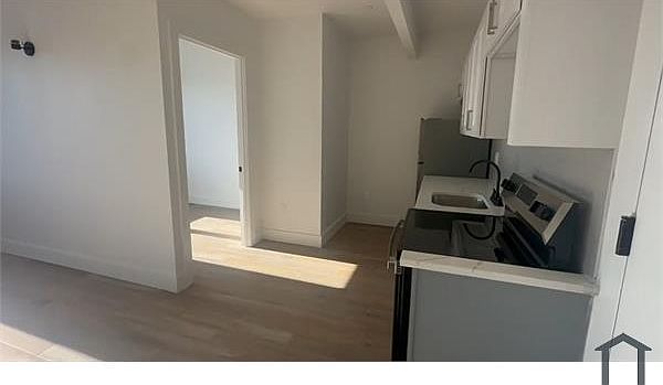 1st image of 401 Beach 30th St Room 2