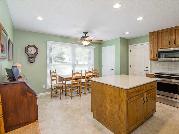 Large pantry, center island with electric outlet, and plenty of room to eat in.