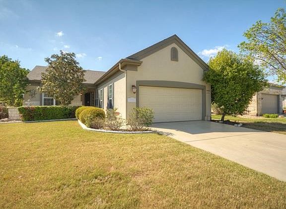Located on the curve of a pretty street, the wide front yard features a stone Courtyard with splashy fountain, just the perfect viewing spot for the annual Mardi Gras Parade!