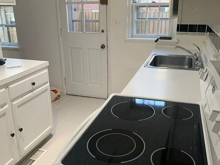 Kitchen with new tile flooring.