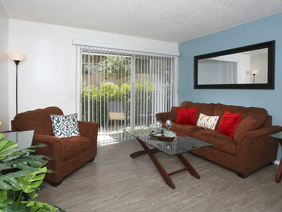 Spacious Living Room area with couch and love seat