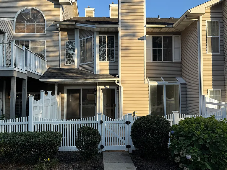 2 stories with fenced in patio area