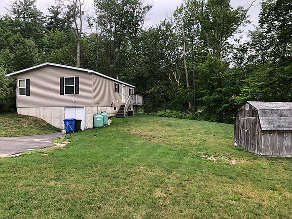 Double door walk in to basement. Utility shed.