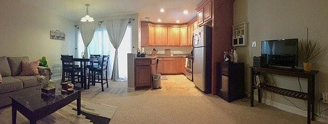 View of the condo plus access to the patio deck. Unit will have updated flooring.