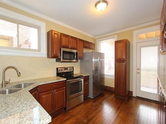 Kitchen with door to access large back patio