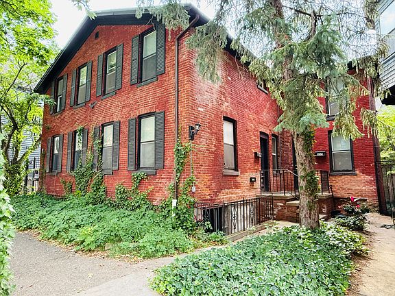 Front of home and apartment entrance across from Eastman