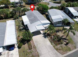 295 Papaya Cir, Barefoot Bay, FL 32976