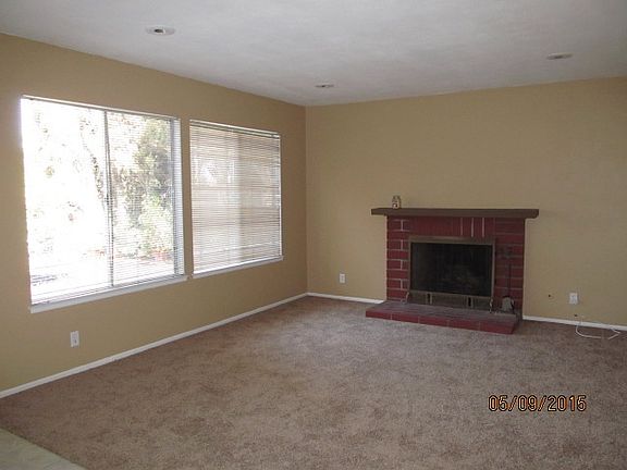 Spacious Living Room with Fireplace