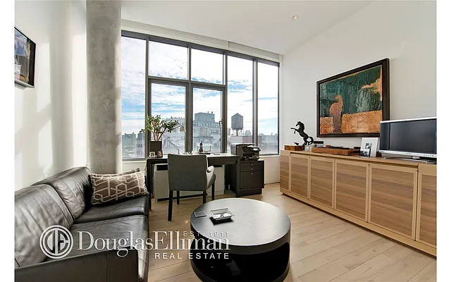 Sold by Douglas Elliman | media 18
