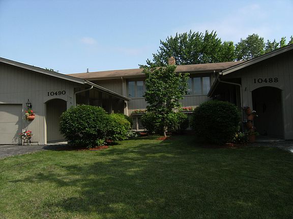 Front of Twin Home. Owner's unit on the left. Rental unit on the right.