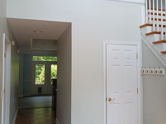 Entranceway. Doors is guest bathroom