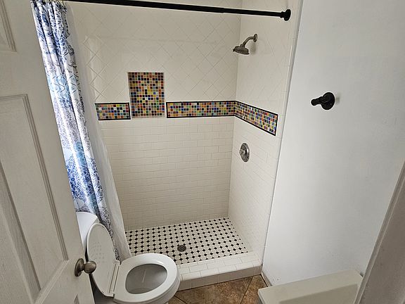 Restroom with stand up shower