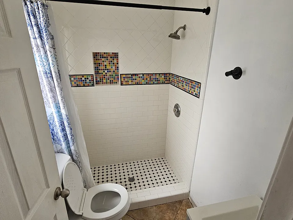 Restroom with stand up shower