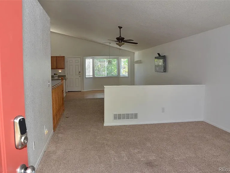 6123 S Quemoy Way — Photo 4