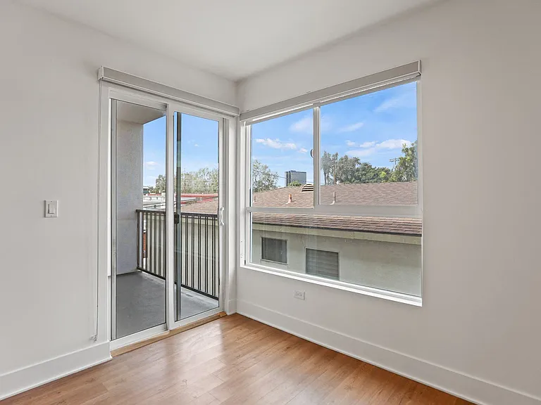 Living Room with Large Windows and Patio
