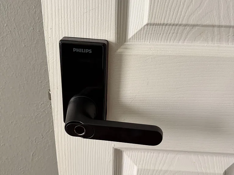 Interior entry door with keyless smart lock hardware for secure, convenient access.