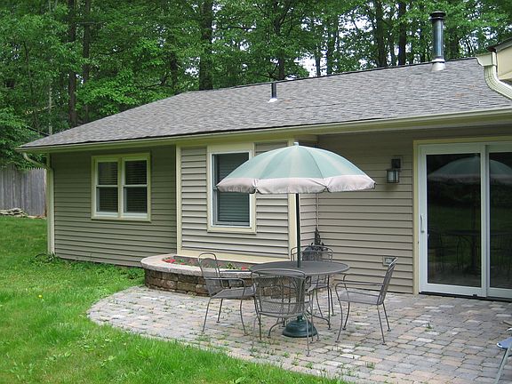 Paver patio off sliders leading to LR