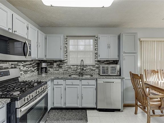 4th image of 5160 Arrowind Rd NW