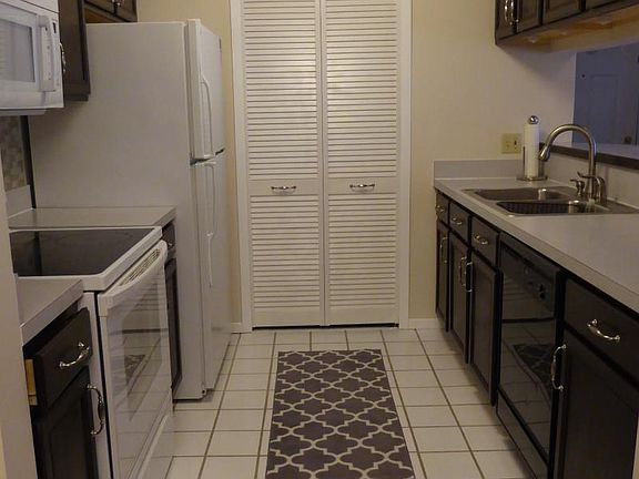 Galley Kitchen with All Appliances