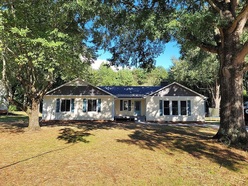 Front yard with mature trees
