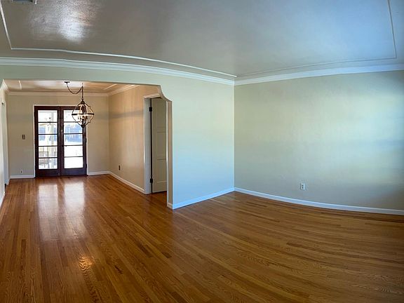 Entry into Living Room. Original Hardwood Floors