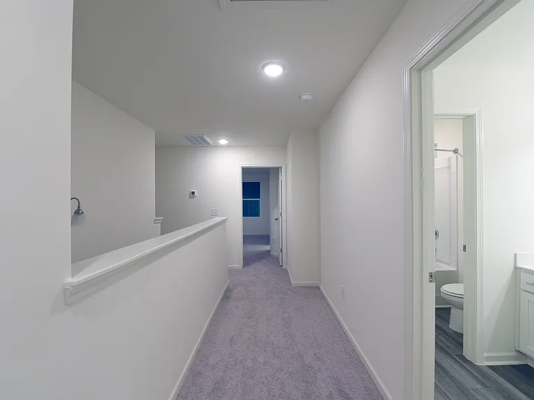 Upstairs hallway and bathroom, Carpet replaced with LVP