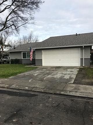 Exterior of the house with two car garage