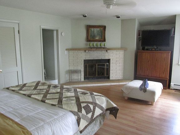 master bedroom with fireplace