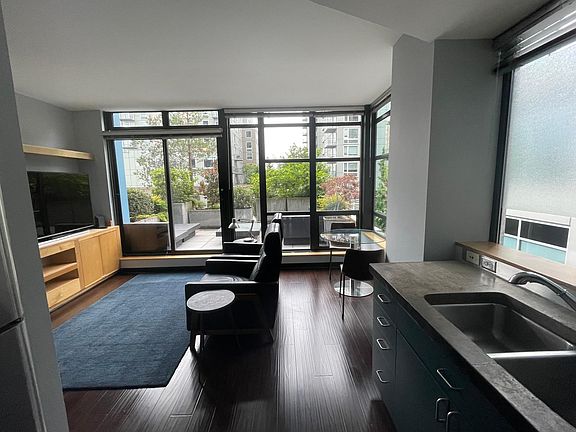 Corner unit and 9 ft ceiling afford ample natural light.