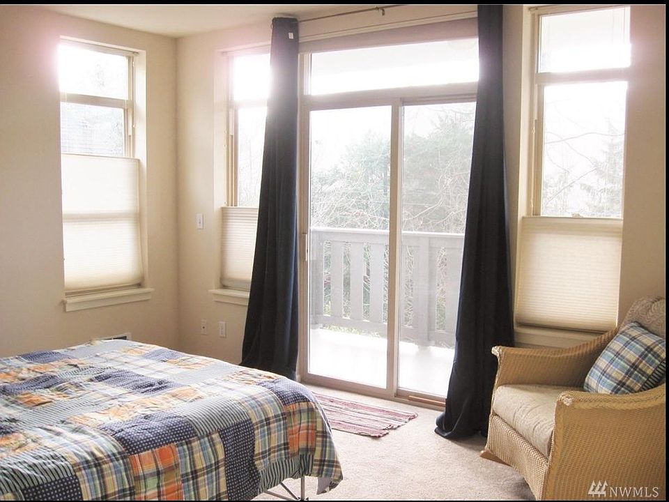 bright and cozy master bedroom that comes with a private bat